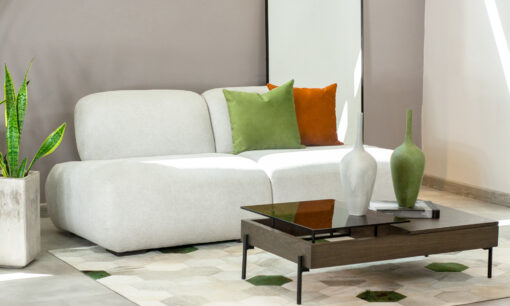Sofá Modular Emma de la marca Aristas visto de frente. Un diseño moderno y elegante con líneas curvas y acabado en tela suave de color Dickens Cuarzo.