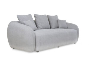 Vista diagonal del Sofá Demand de la marca Aristas. Un diseño moderno y minimalista de líneas curvas, con un asiento acolchado y acabado en tela suave.