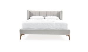Cama Florencia de la marca Aristas vista en perspectiva frontal. Un diseño elegante con un cabecero alto, líneas limpias y patas delicadas en madera.
