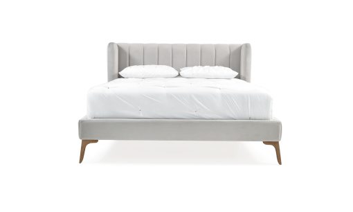 Cama Florencia de la marca Aristas vista en perspectiva frontal. Un diseño elegante con un cabecero alto, líneas limpias y patas delicadas en madera.