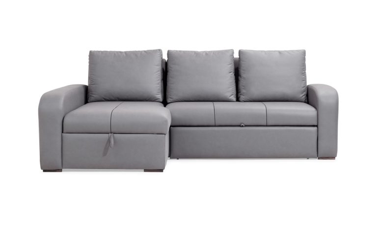 Vista frontal de la Sala en L Sofá Cama Multifuncional Napoli Plumas de Aristas. Un diseño acolchado y elegante de líneas limpias, con asientos amplios y un acabado en tela suave de color neutro.